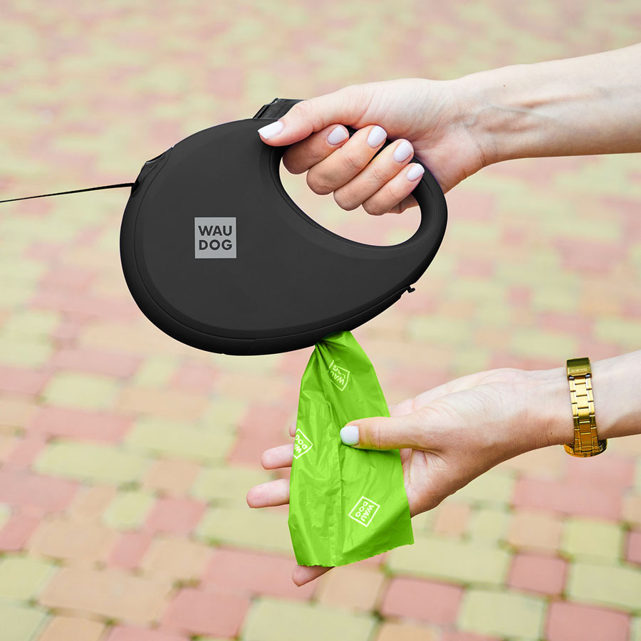 Повідець-рулетка для собак WAUDOG R-leash з контейнером для пакетів, світловідбивна стрічка, L, до 40 кг, 5 м, чорний